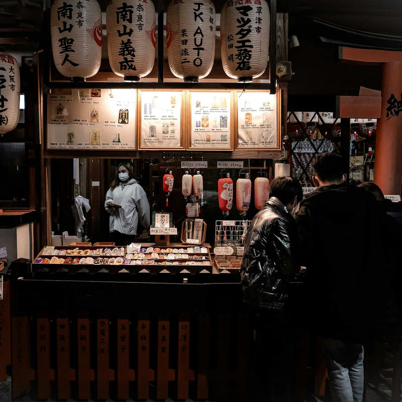 Load video: A DJ in Himeji changing records and a bar tender pouring a glass of red wine.
